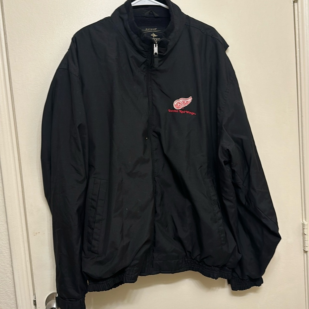 XXL Detroit Red Wings heavy windbreaker.  Way too big for me.  30” armpit to